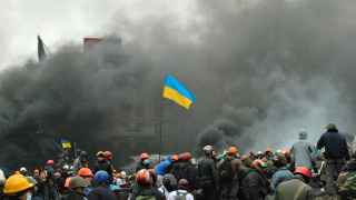 Попробуйте самостоятельно определить происходящее на центральной площади Киева. Это февраль 2014 года