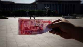 Аналитики предвидят ослабление китайской валюты